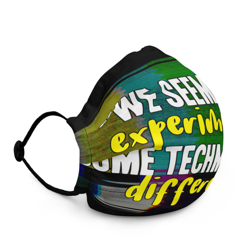 We seem to be experimenting some techmological differences. - Idiocracy Premium face mask - Image 2
